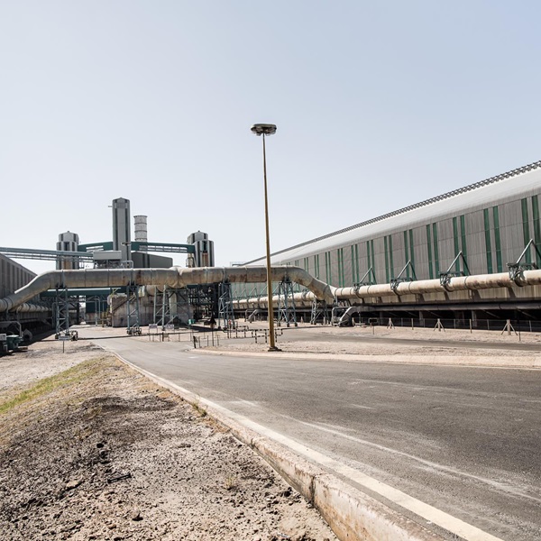 A photo of buildings connected by a pipeline at Hillside Aluminium